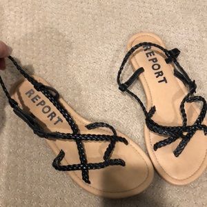 Black report sandals